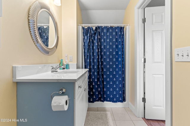 4151 Windham Ln, Southport, NC 28461 - bathroom with tile patterned flooring, vanity, and a shower with shower curtain