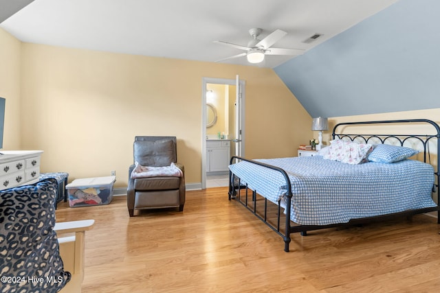 4151 Windham Ln, Southport, NC 28461 - bedroom with wood finished floors, lofted ceiling, ceiling fan, and ensuite bath