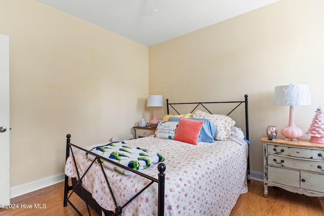 4151 Windham Ln, Southport, NC 28461 - bedroom featuring wood finished floors, baseboards, and a ceiling fan