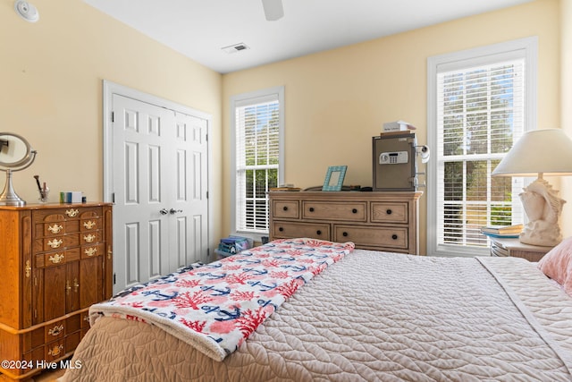 4151 Windham Ln, Southport, NC 28461 - bedroom with a closet and a ceiling fan