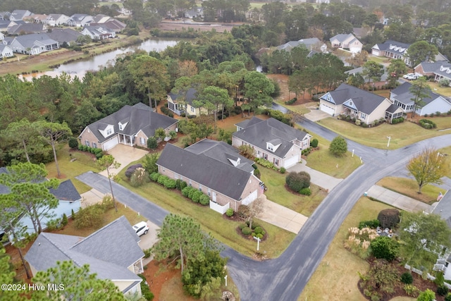 4151 Windham Ln, Southport, NC 28461 - aerial view of property and surrounding area featuring nearby suburban area and a nearby body of water