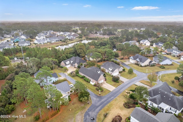 4151 Windham Ln, Southport, NC 28461 - aerial view of property and surrounding area with nearby suburban area and a large body of water