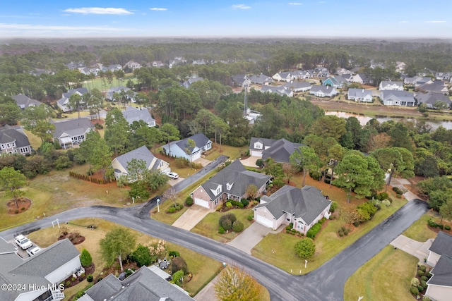 4151 Windham Ln, Southport, NC 28461 - aerial view of property and surrounding area with nearby suburban area and a large body of water