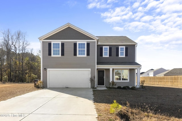 view of front of property featuring a garage