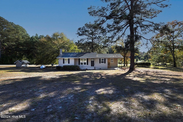 ranch-style home with a porch