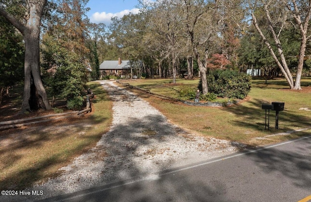 exterior space with a front lawn