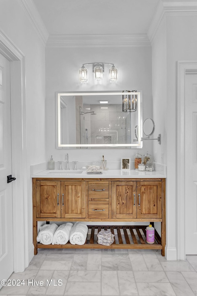 bathroom with vanity, an enclosed shower, and crown molding