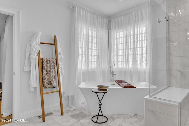 bathroom with tiled tub