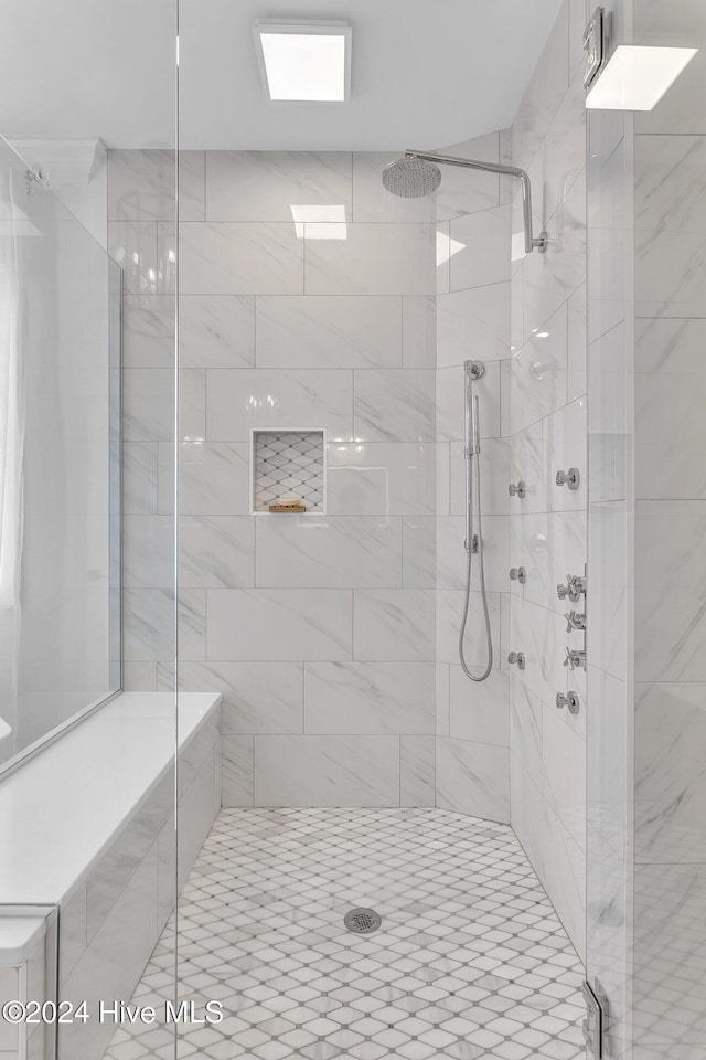 bathroom featuring an enclosed shower