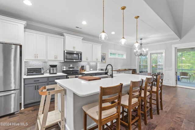 kitchen featuring gray cabinetry, white cabinetry, sink, and appliances with stainless steel finishes