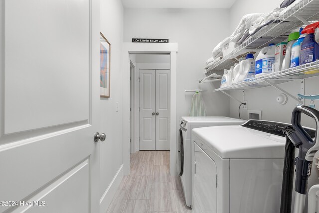 washroom with washer and clothes dryer