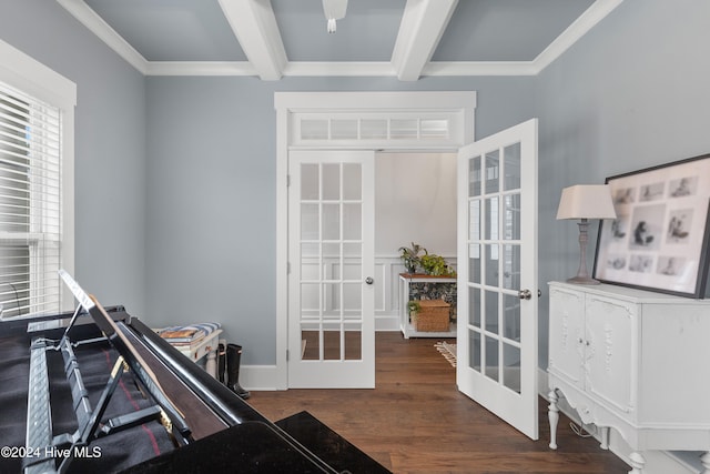 interior space with beamed ceiling, french doors, dark hardwood / wood-style floors, and ornamental molding