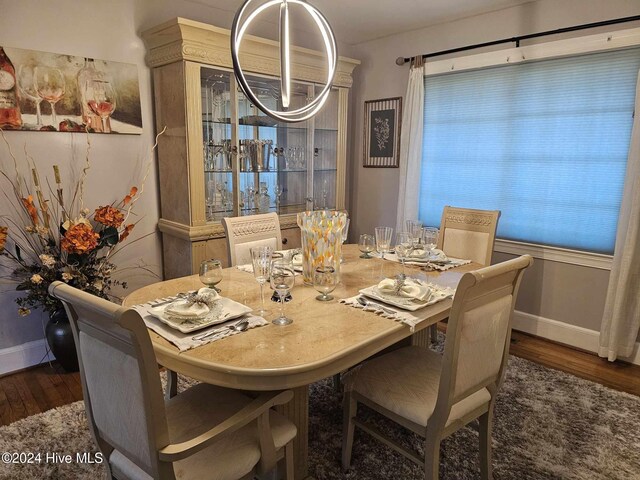 dining room featuring dark hardwood / wood-style flooring