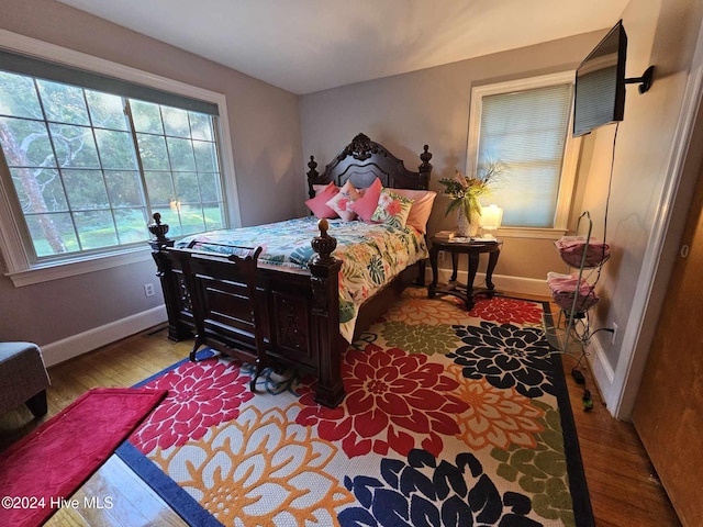 bedroom with light wood-type flooring