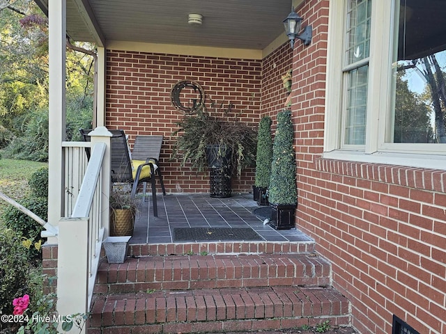 view of patio featuring a porch