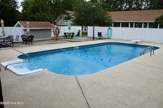 955 Mt Pisgah Rd SW, Supply, NC 28462 - view of pool with a patio, a fenced backyard, and a diving board