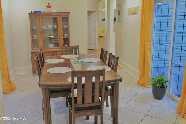 955 Mt Pisgah Rd SW, Supply, NC 28462 - dining space with light tile patterned flooring and baseboards