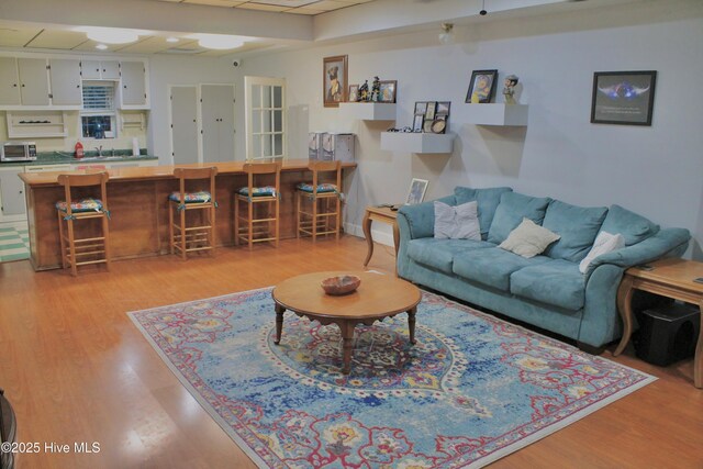 955 Mt Pisgah Rd SW, Supply, NC 28462 - living room featuring light wood-type flooring