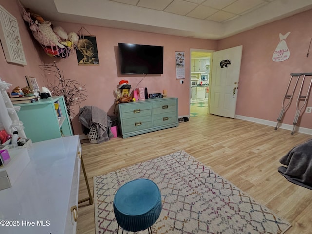 955 Mt Pisgah Rd SW, Supply, NC 28462 - living room featuring wood finished floors, baseboards, and a raised ceiling