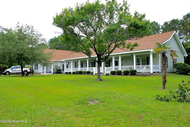 955 Mt Pisgah Rd SW, Supply, NC 28462 - view of front of home featuring a porch and a front yard