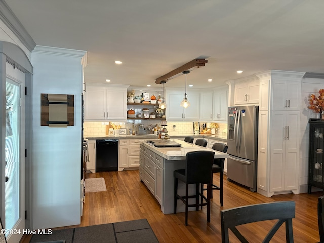 kitchen with dishwasher, light hardwood / wood-style flooring, stainless steel fridge, decorative light fixtures, and white cabinetry