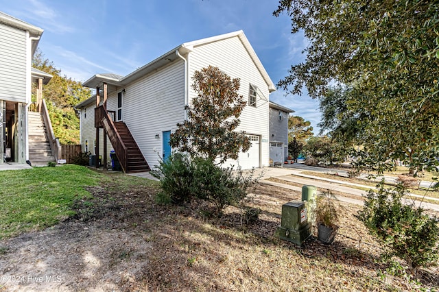 view of property exterior featuring a garage