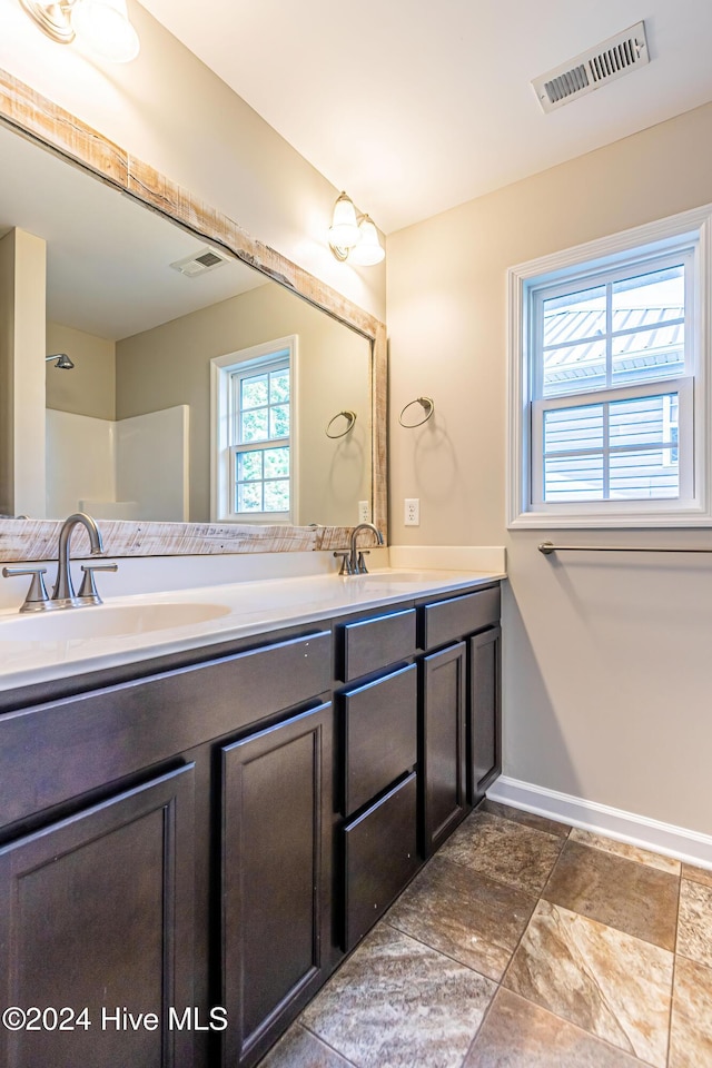 105 James Ave Unit A, Surf City, NC 28445 - full bath with double vanity and baseboards
