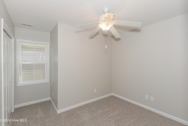105 James Ave Unit A, Surf City, NC 28445 - spare room featuring ceiling fan, baseboards, and light carpet