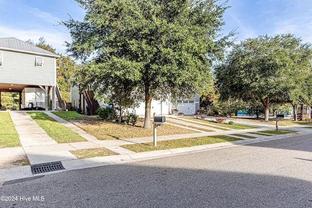 view of front of home with a carport