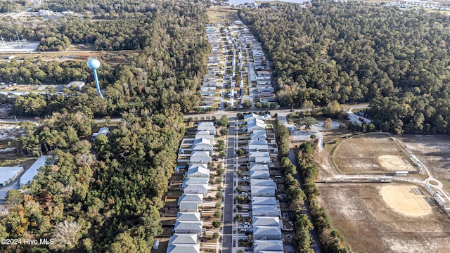 105 James Ave Unit A, Surf City, NC 28445 - view of property location featuring nearby suburban area and a heavily wooded area