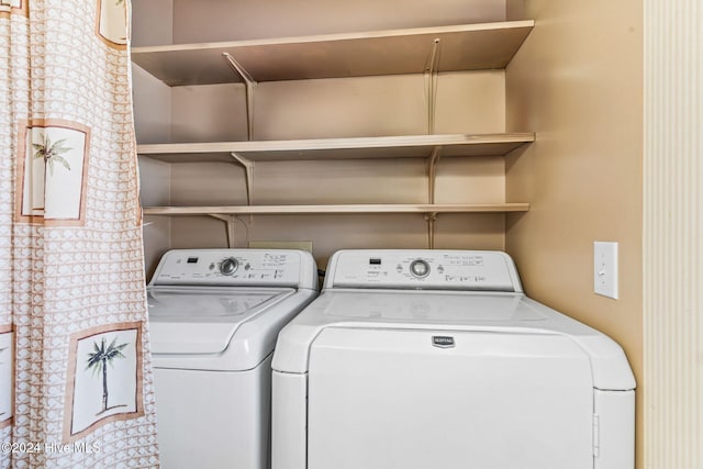 laundry area featuring independent washer and dryer