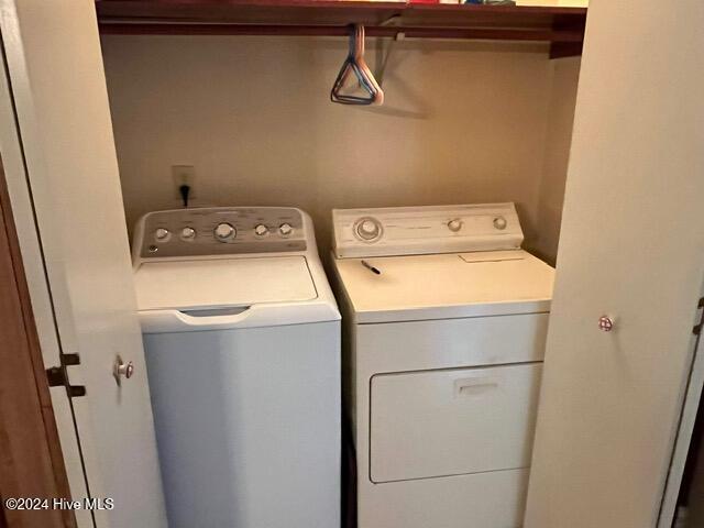 washroom with washer and dryer