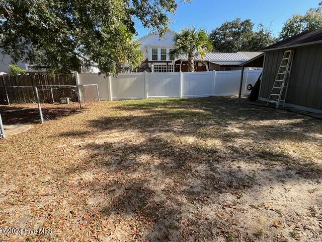 138 NW 17th St, Oak Island, NC 28465 - view of fenced backyard