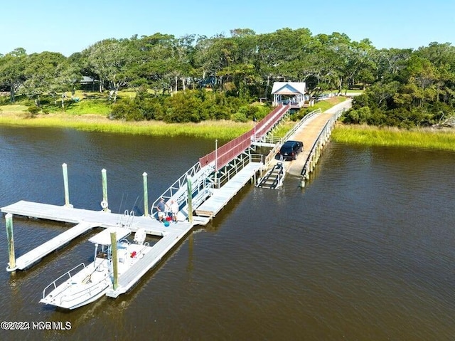 dock area featuring a water view