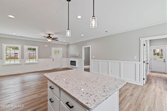 2013 E Hawthorne St, Goldsboro, NC 27530 - kitchen with crown molding, pendant lighting, a center island, a ceiling fan, and recessed lighting