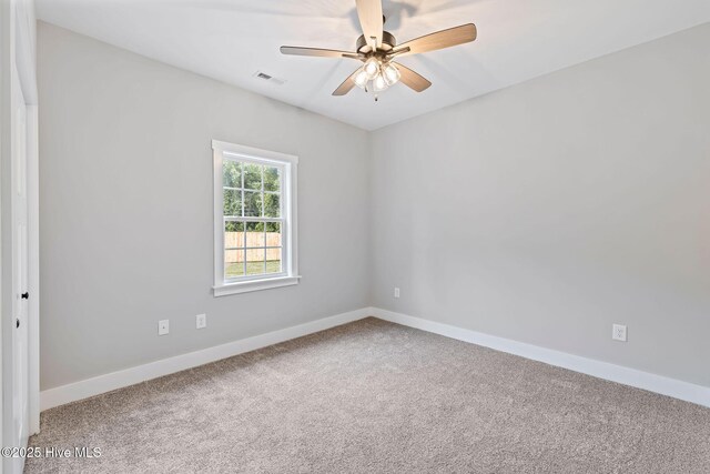 2013 E Hawthorne St, Goldsboro, NC 27530 - unfurnished room featuring carpet floors and baseboards