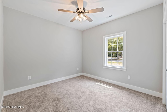 2013 E Hawthorne St, Goldsboro, NC 27530 - carpeted spare room featuring baseboards and a ceiling fan