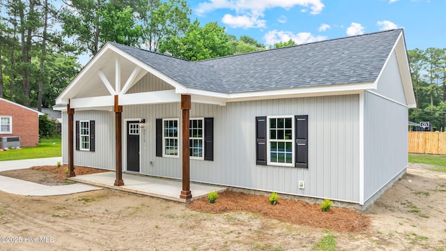 2013 E Hawthorne St, Goldsboro, NC 27530 - view of front facade featuring roof with shingles and a porch