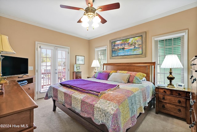 carpeted bedroom with access to outside, ceiling fan, and crown molding