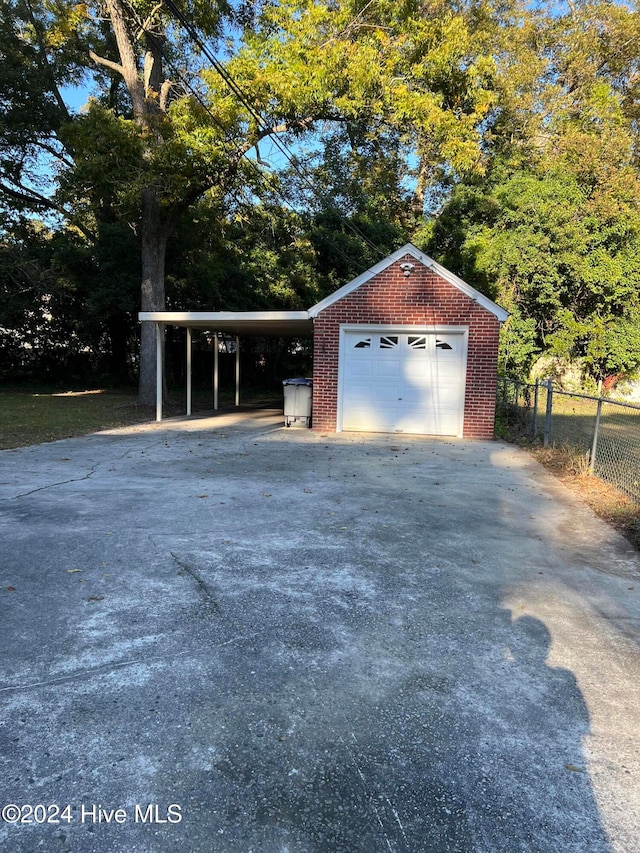 garage with a carport