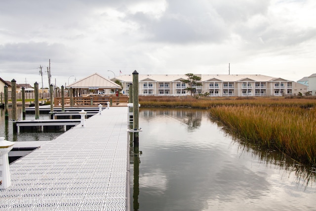 dock area featuring a water view