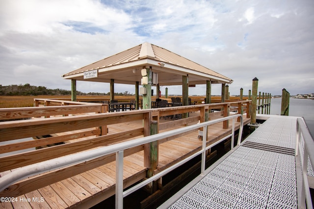 dock area featuring a water view and a gazebo