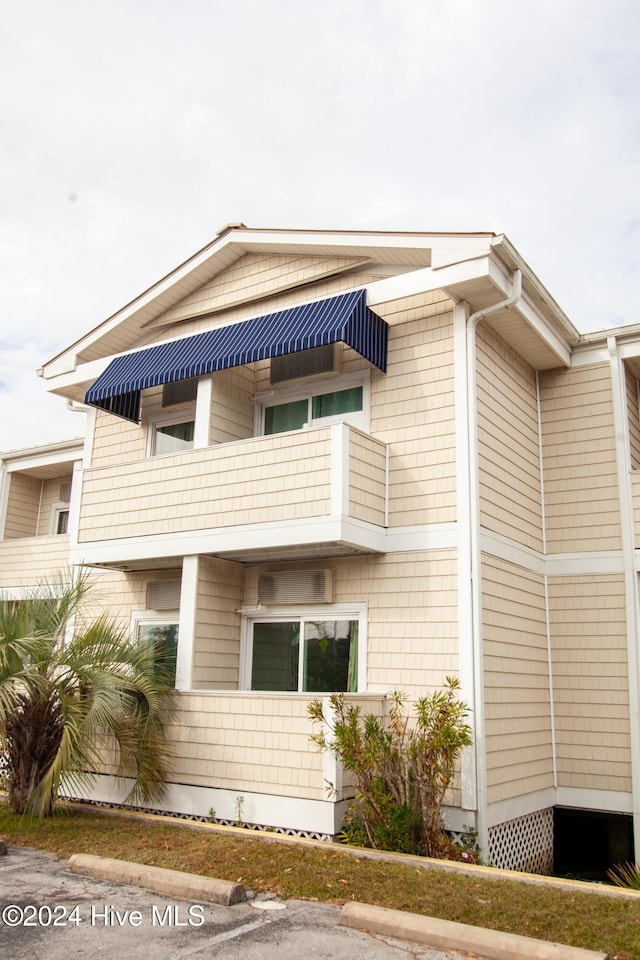 view of property exterior featuring a balcony