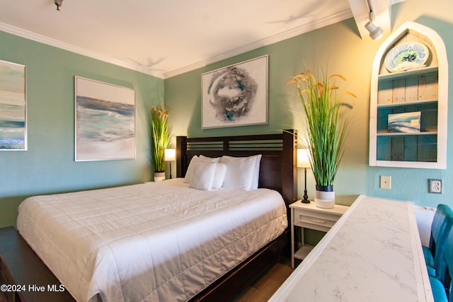 bedroom featuring ornamental molding