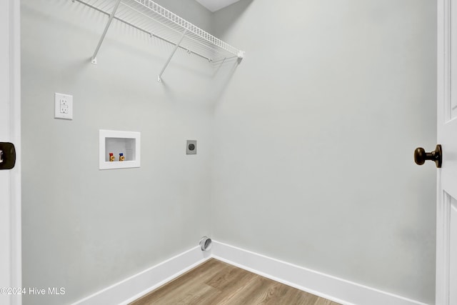 laundry room featuring washer hookup, wood-type flooring, and electric dryer hookup