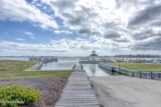 dock area with a water view