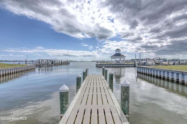 dock area featuring a gazebo and a water view