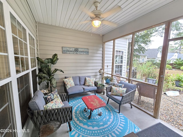 sunroom with a ceiling fan