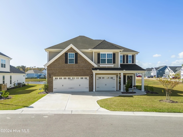 view of front of house featuring brick siding, a front lawn, a residential view, concrete driveway, and an attached garage