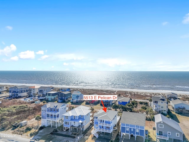 aerial view featuring a beach view and a water view